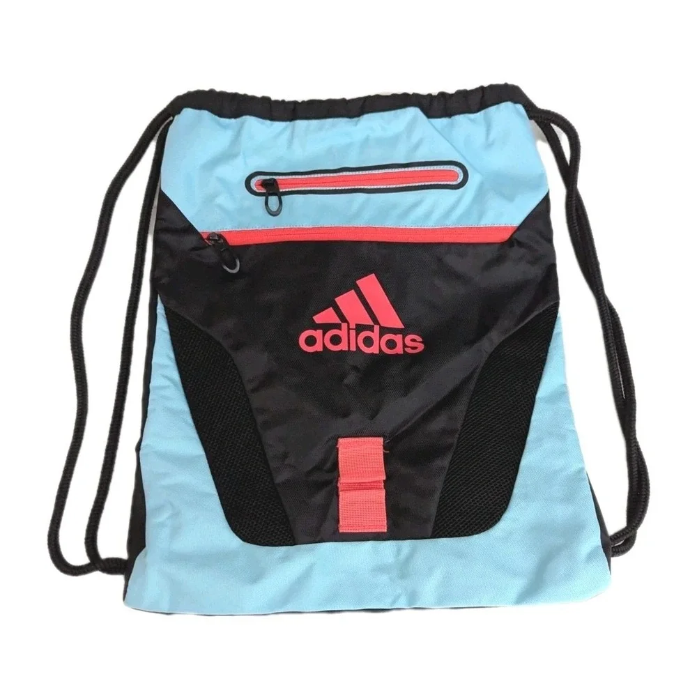 adidas blue and pink backpack Young Back-to-School Creator 21L, Adi Multi Collage/Onix Grey/Almost Blue, One Size while the side pocket securely holds your padel racquet for quick and easy access adidas Midway Backpack, Assorted Colors